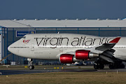 . sunnier weather of Orlando, Boeing 747400 GVROM of Virgin Atlantic. (vrom man )