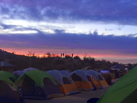 a group of tents in a field