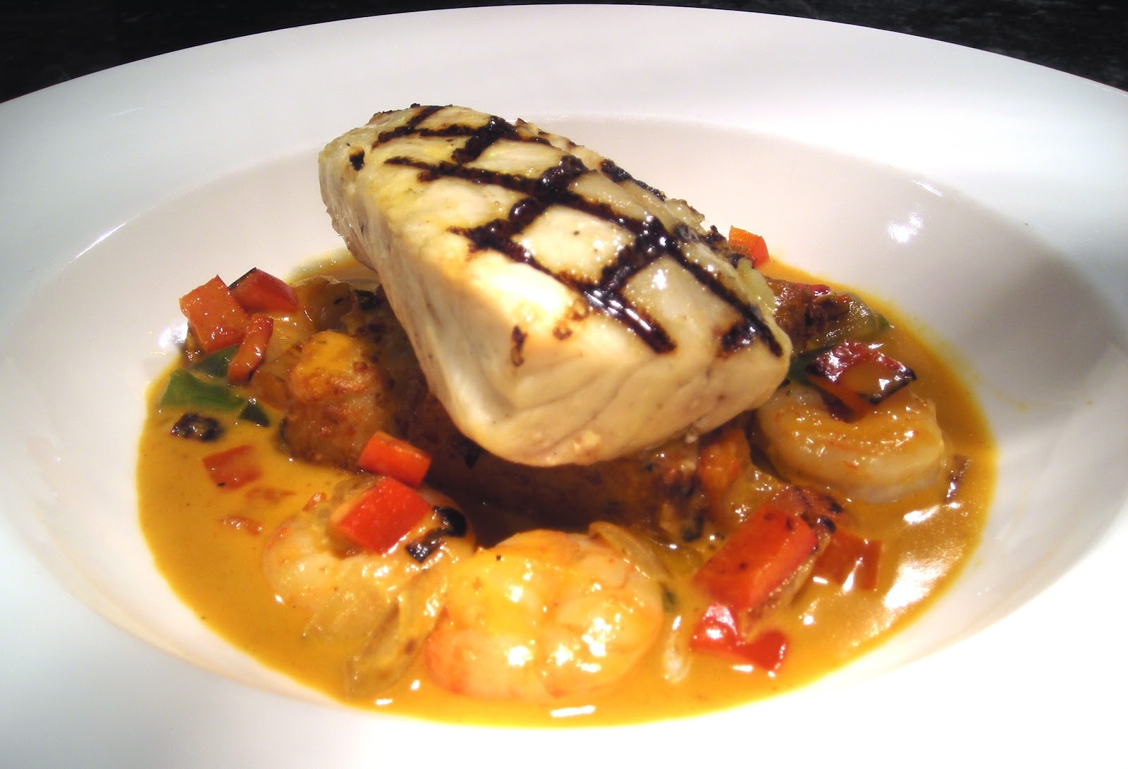 The Wolf Pack's Culinary Tour Grilled Redfish, Poblano Grit Cake