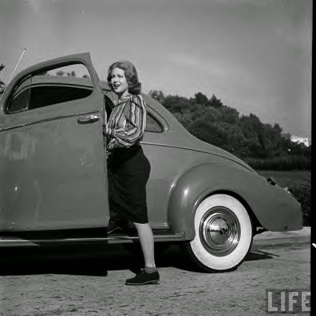 Lana Turner and her coupe ~