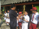 Penyerahan Piala Kejuaraan