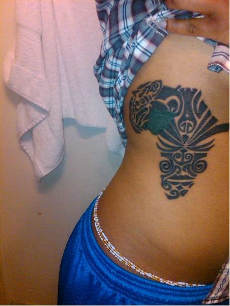 Jibola represents her roots with an AMAZING tattoo of Africa,