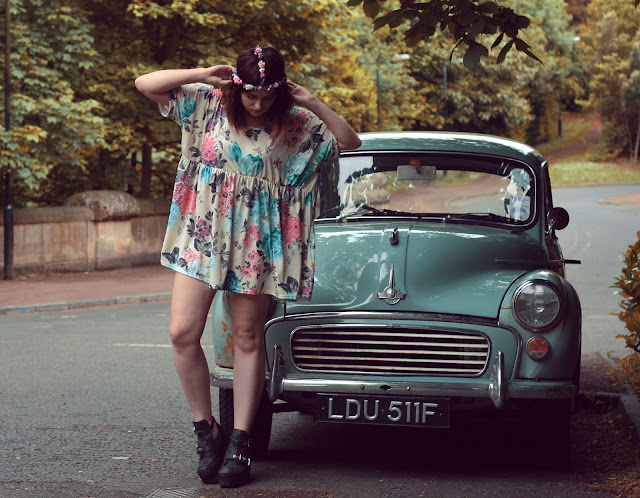 morris minor vintage car, hippy inspired vintage look, floral miss guided dress, perfect festival wear, styled with a hippy bohemian flower head chain. morris minor vintage car, hippy inspired vintage look, floral miss guided dress, perfect festival wear, styled with a hippy bohemian flower head chain.