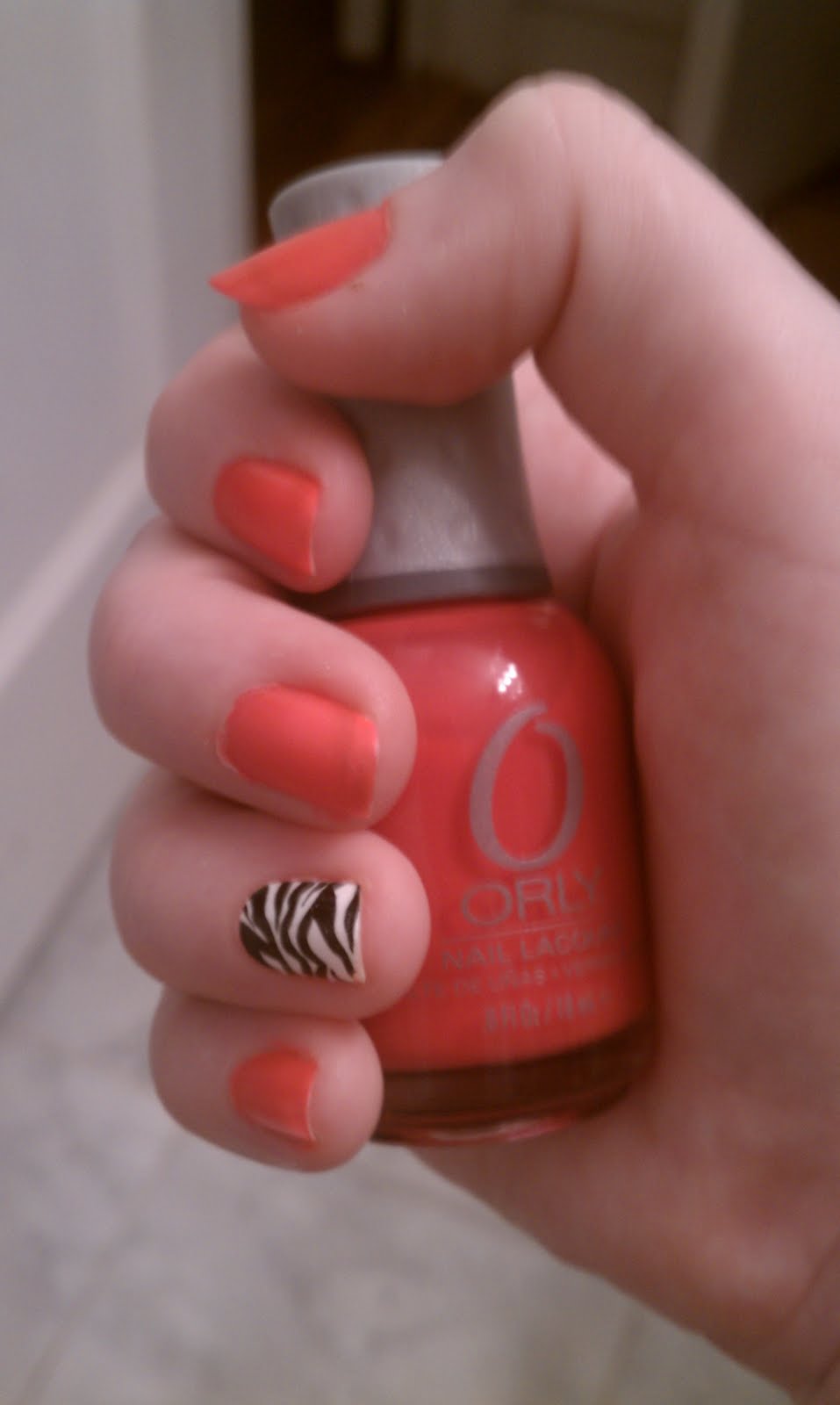 Sally Hansen's Salon Effects strips in Wild Child on my ring fingers: