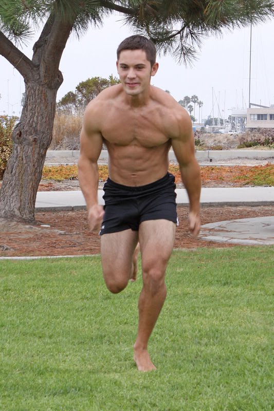 Boys in short shorts Gym fit muscle lad in sports shorts
