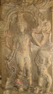 Sculpture on a pillar, probably Shiva