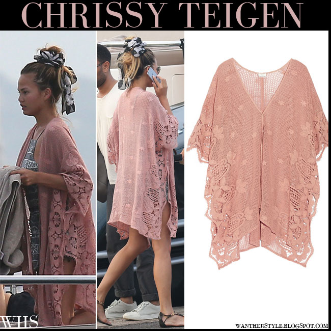 Chrissy Teigen in rose pink crocheted caftan in Saint Tropez on July 21