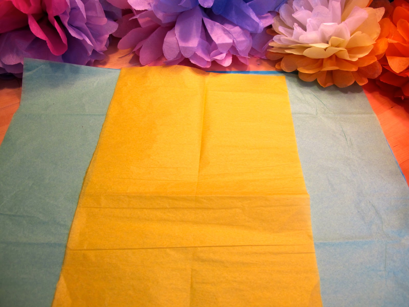 Then, take just the yellow center layers and fan fold. Then fold in ...
