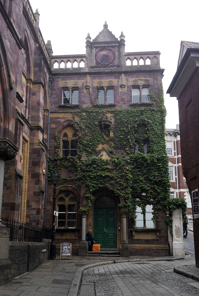 Exeter city centre cute ivy covered building cobblestone street pretty
