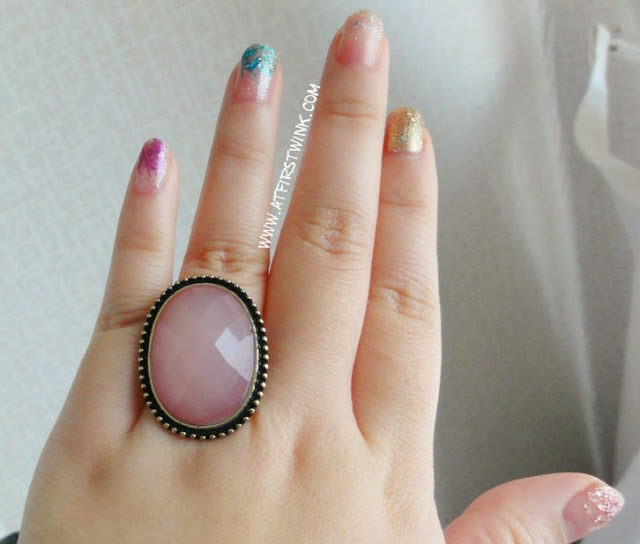 New Look ring with large pink gem stone and pretty nails