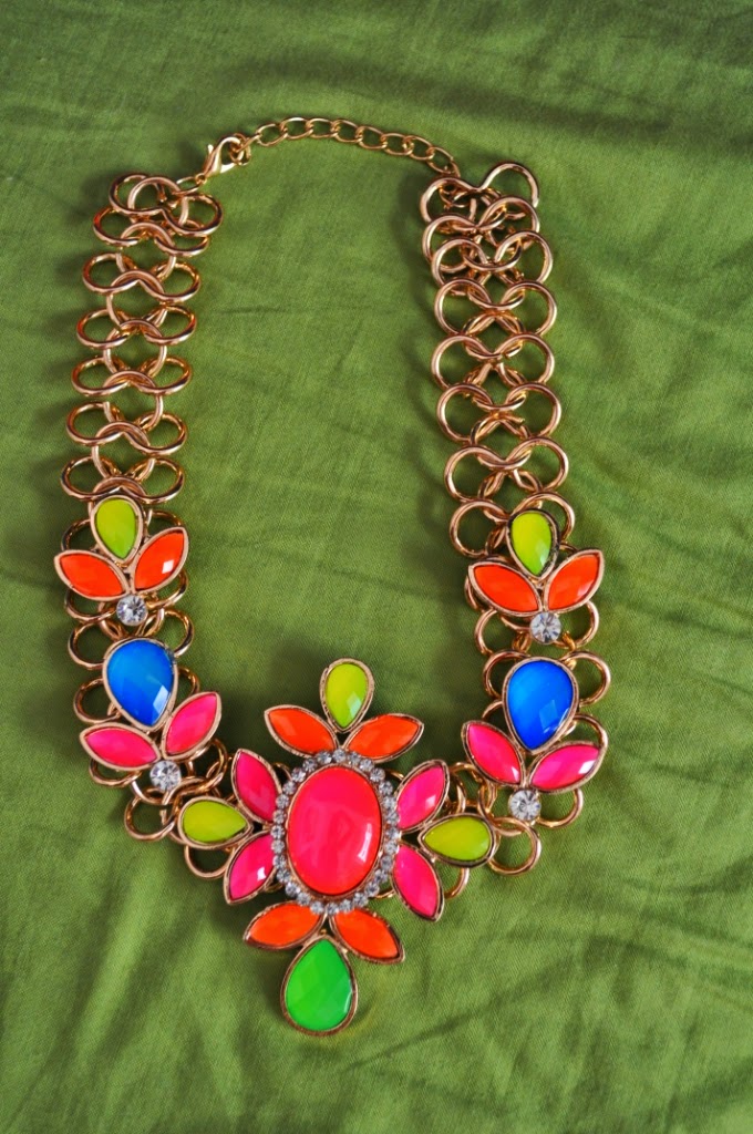 http://www.aliexpress.com/item/Hot-New-arrival-fashion-bag-statement-new-items-shourouk-rainbow-colored-gemstones-transparent-PVC-single-shoulder/1712630343.html