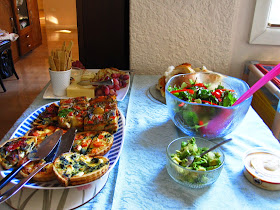 Selection of lunch dishes laid out on a table.