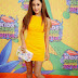 Ariana Grande Battles The Kids' Choice Awards Orange Carpet With A Bright Yellow Mini!