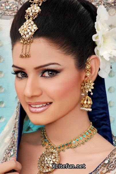 Pakistani and indian bridal eyes shimmr makeup and mehndi are beautiful