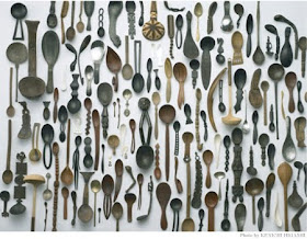 over 100 spoons of assorted sizes and styles