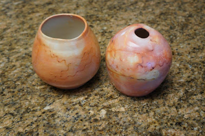 Ceramic pots from a foil saggar raku firing.