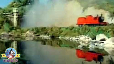 James train smocking humming bees out going through a long railway tunnel next to the fishing river