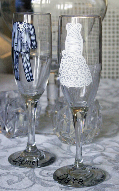 I love these bride and groom champagne glasses from J Bee Designs