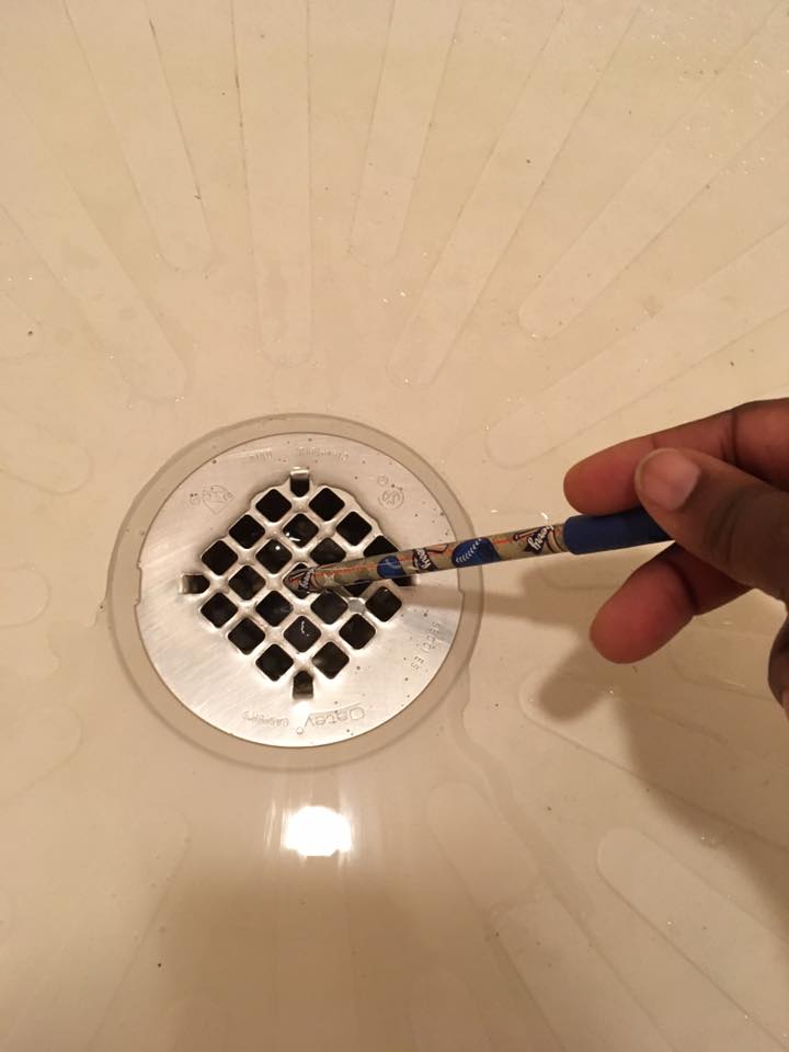 Help, my shower drain is clogged! No Chemicals Required! One Brown Mom