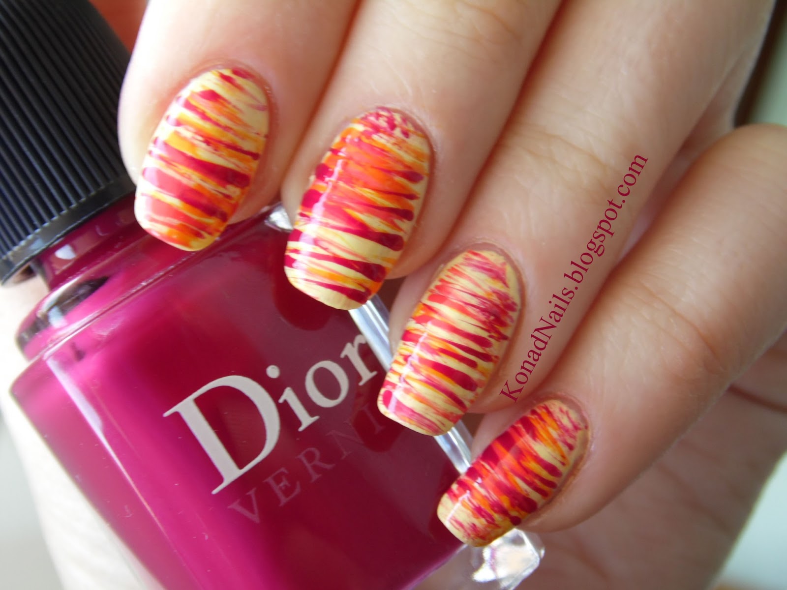 Konad Addict Striped nail art using fan brush