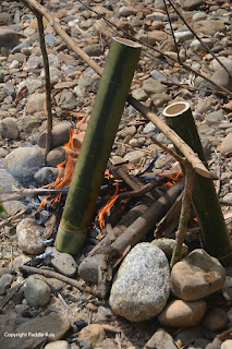 Cooking rice in bamboo