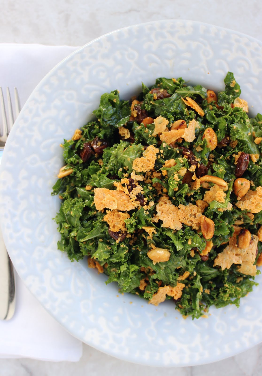 Stew or a Story Kale Salad with Raisins, Spicy Peanuts, and Crispy Cheddar