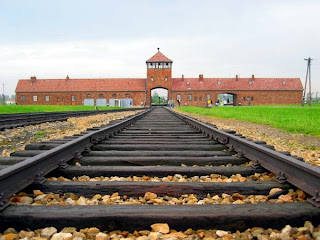 Remember there are three large camps at Auschwiz: Auschwitz I, Auschwitz-Birkenau or Auschwitz II, and Auschwitz III. This photo is of Auschwitz II which was a labor and a death camp.