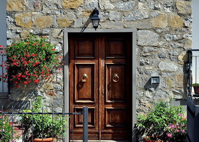 Wooden Door in Castagnoli, Italy - Photo by Taste As You Go