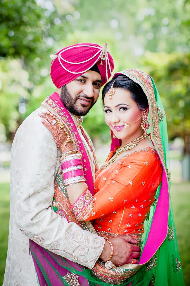 Punjabi Bride and Groom in Pink and Orange