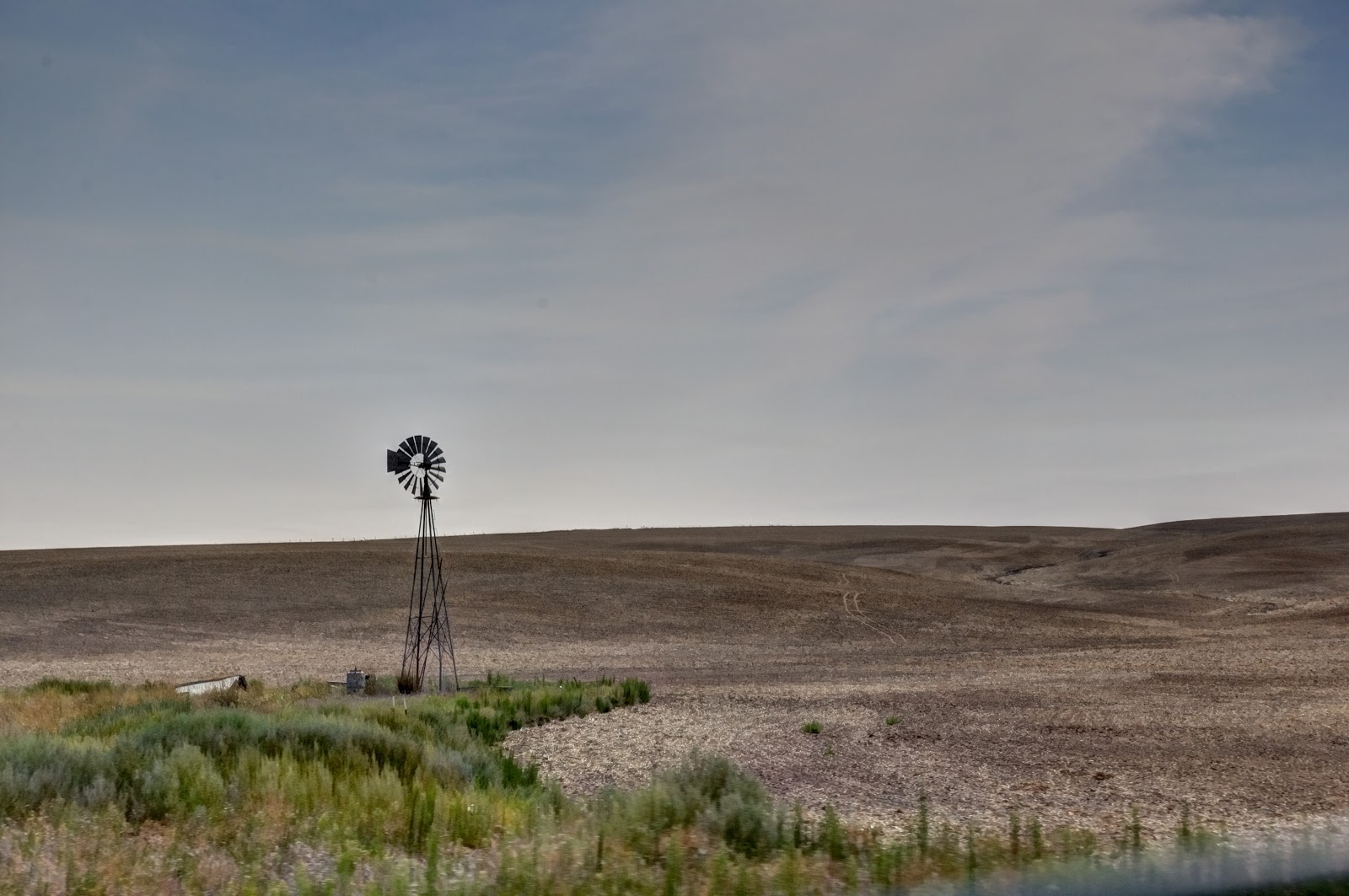 This Life in Ruins Almira Water tower and Old school Windmill , Almira, Wa