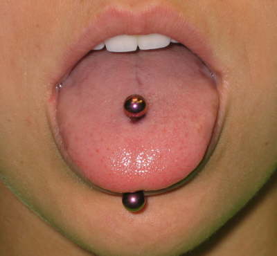 Next is this eyebrow piercing just looks odd