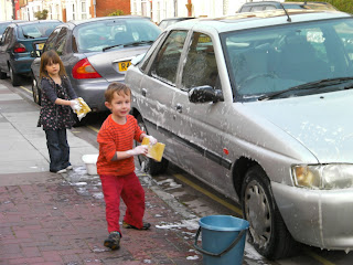 washing the car, child slave labour