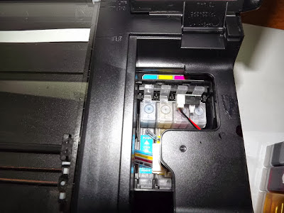 ink cartridges in the printer and system ink cartridges in the printer and system