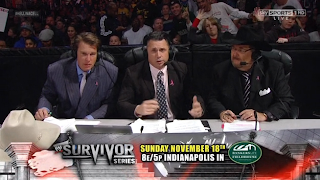 JBL Michael Cole and Jim Ross at the Commentary table