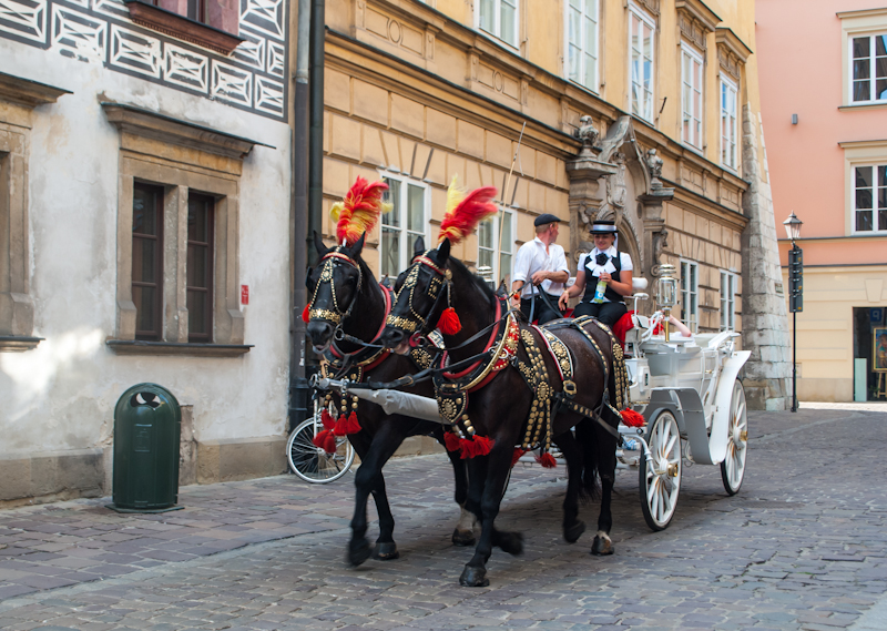 horse drawn carriages in Kraków, Poland horse drawn carriages in the side streets of Kraków, Poland
