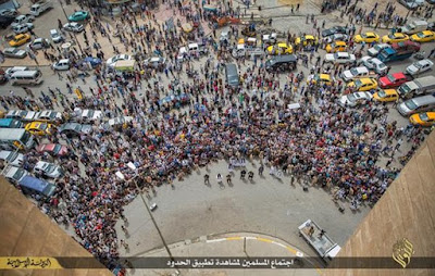 Sick crowd gathered to watch ISIS murder three gay men. Sick crowd gathered to watch ISIS murder three gay men