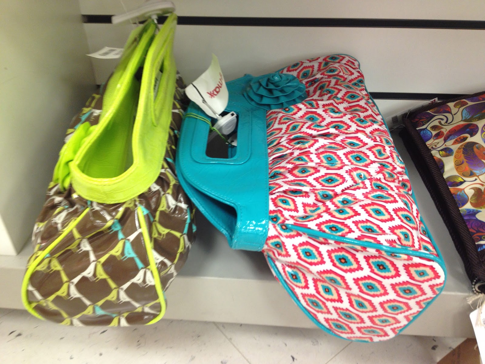 ... check out the purses next time you are at TJ Maxx (and Marshalls too