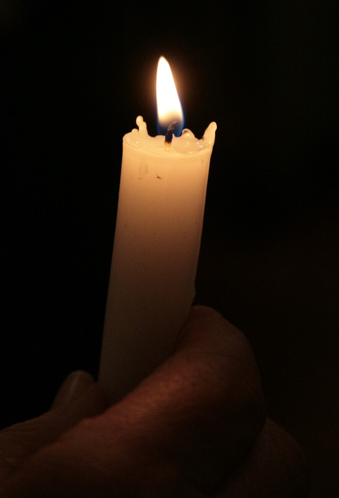 CAPtions A Candle Burning; A Song Still Singing