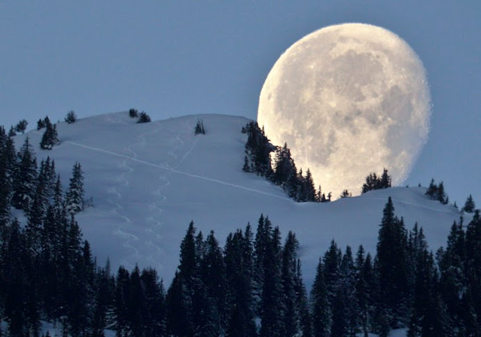 the Moon setting over the mountain Untervaz