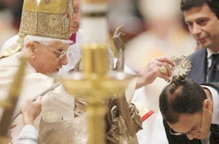 Magdi Cristiano Allam being baptized by Pope Benedict XVI at the time of his conversion to Catholicism