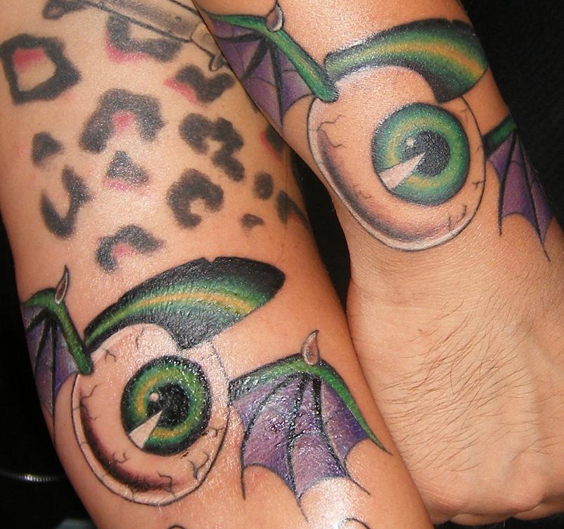 Eyes Matching Tattoos on Hand