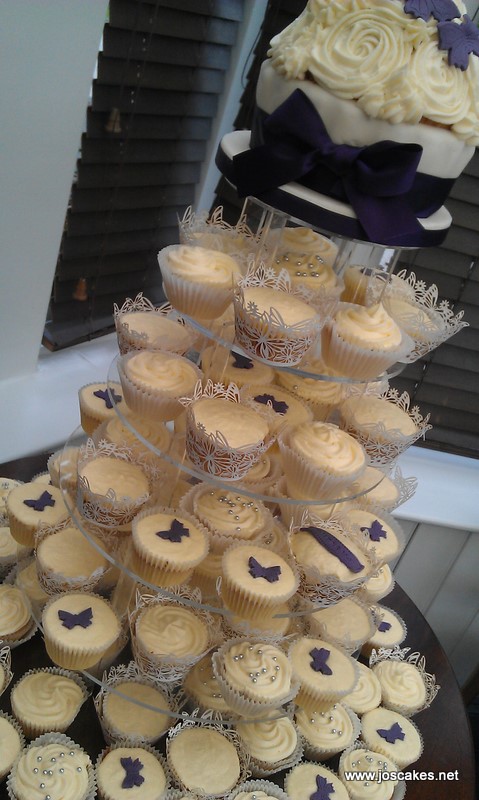 purple and ivory cupcake wedding cakes picture of a wedding table with sash