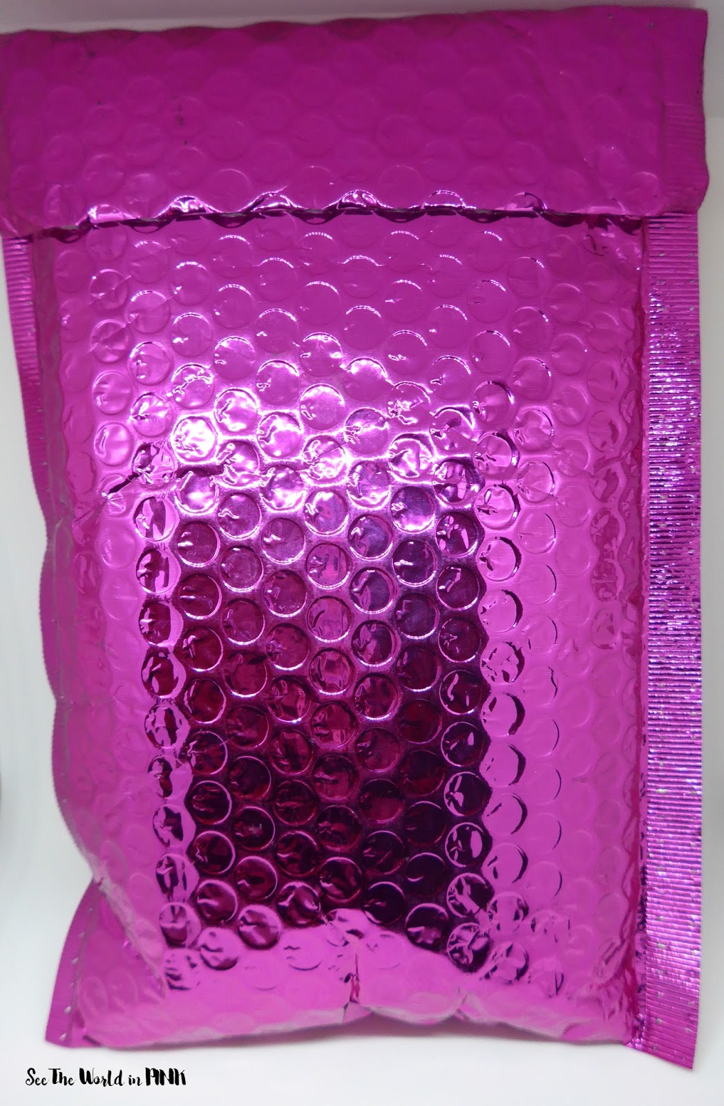 July 2015 Ipsy Glam Bag Beauty Bag Review See the World in PINK