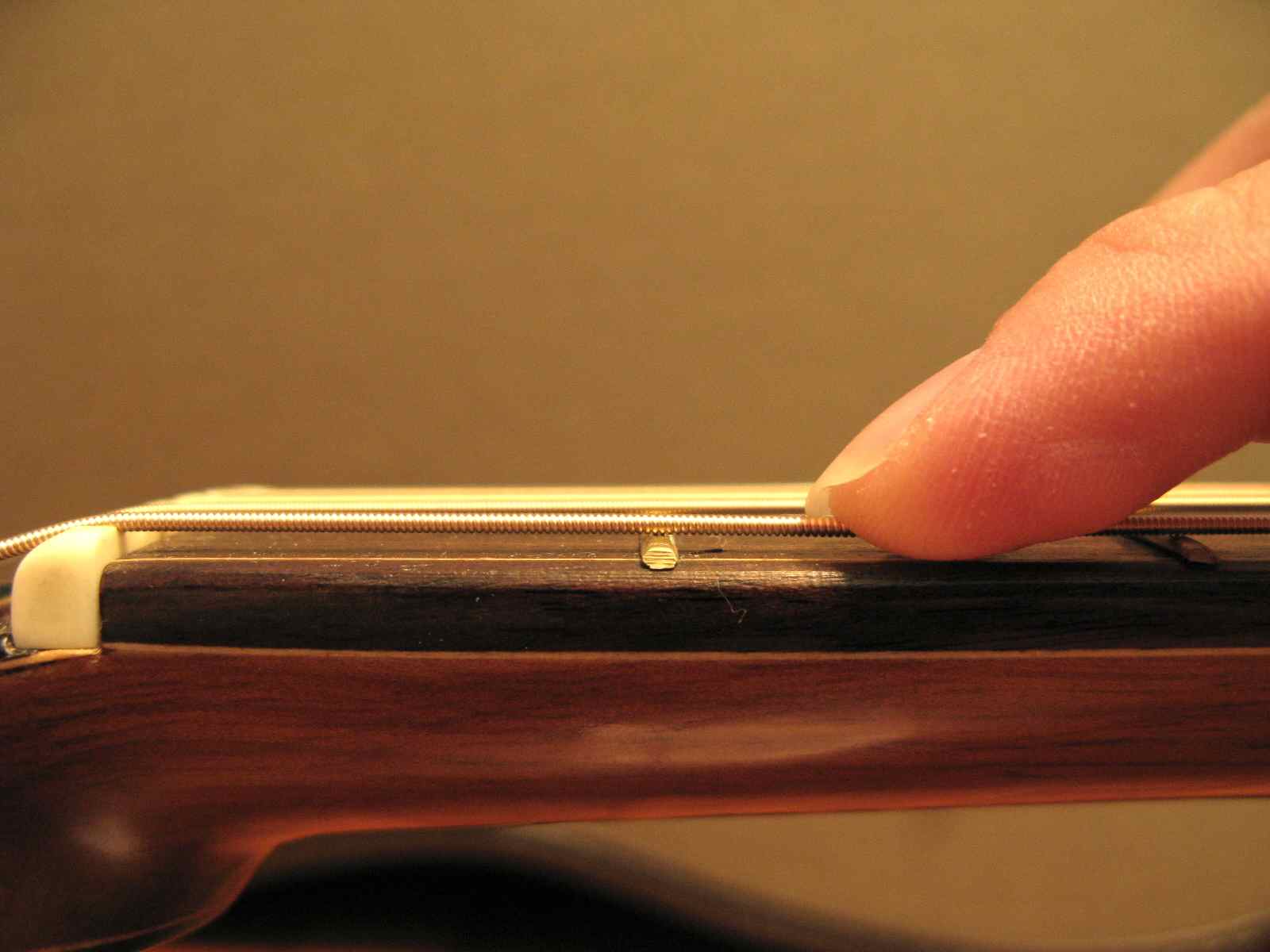 Guitaring Passionately Bite Size Tips 002 String Height Nut