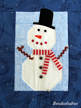 "Frosty" is an adorable quilt my dear friend Pat made for me.  xo