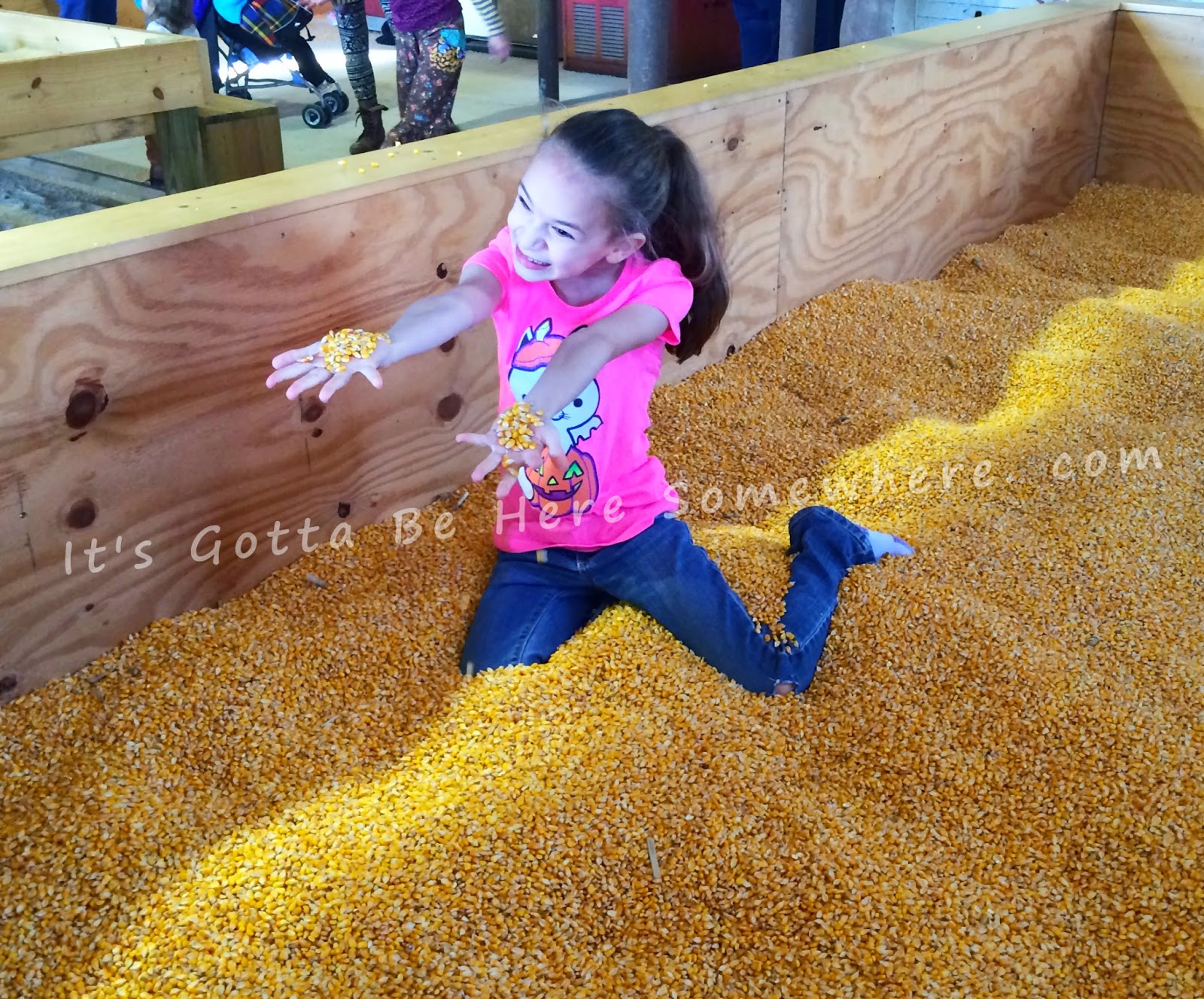 It's Gotta Be Here Somewhere Corn crib + kids = pure joy