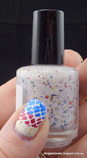 Pretty and Polished Jawbreaker with metallic red, yellow and blue stamping