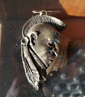 indian head earrings by alex streeter