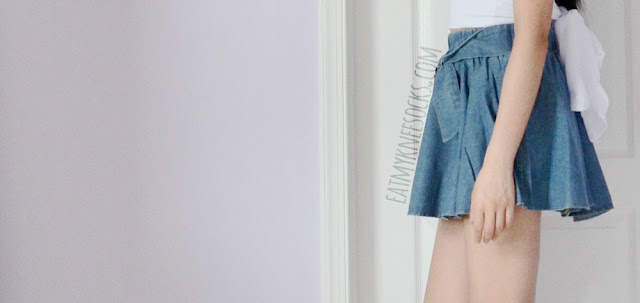 Yumart: Denim Skirt - Modeled Side view of the blue flared denim waist-bow skirt from Yumart, from the brand Tokyo Fashion.