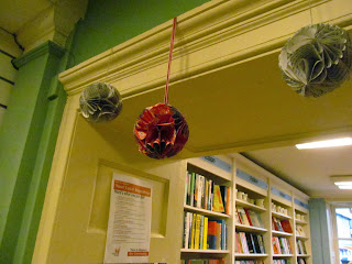 Baubles hanging in the doorways of the Old Hall Bookshop